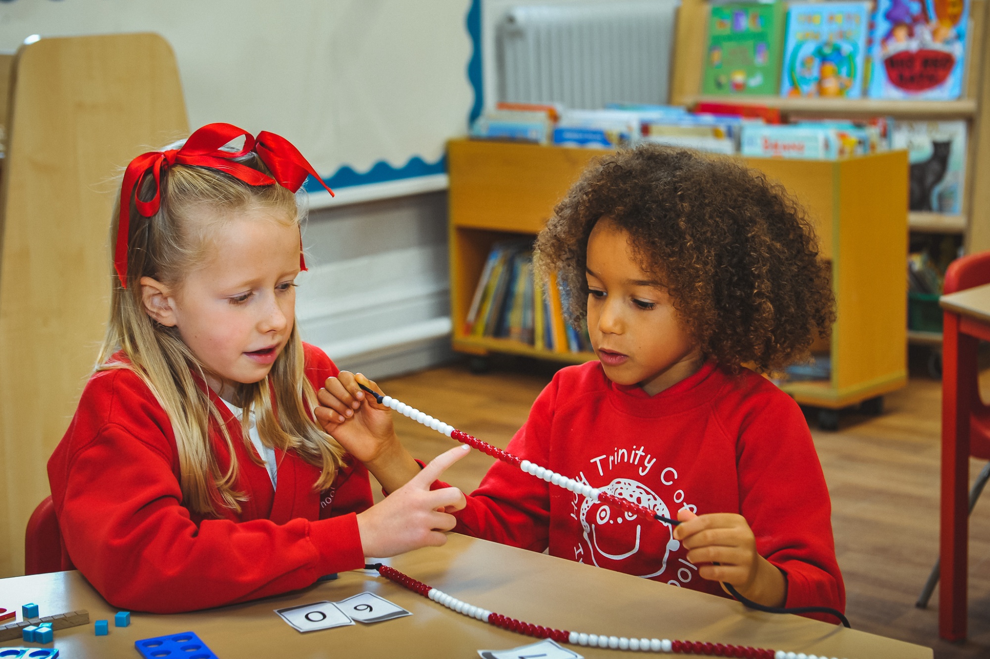 Two students studying maths